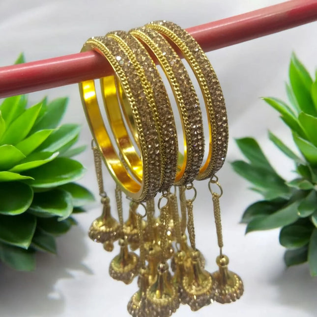 Golden Latkan Bangles with Embroidered Red Potli