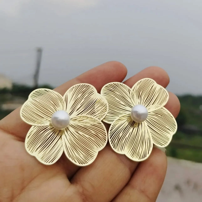 "Korean golden flower pearl earrings – elegant gold-plated floral studs for women"