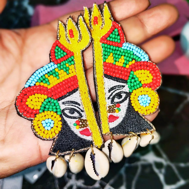 Handmade beaded Durga Ma earrings with golden Trishul and cowrie shells – festive Navratri jewelry